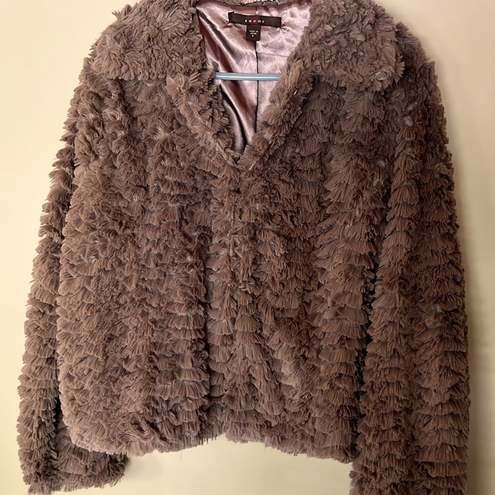 Long sleeve Faux fur brown jacket. Fully silk lined